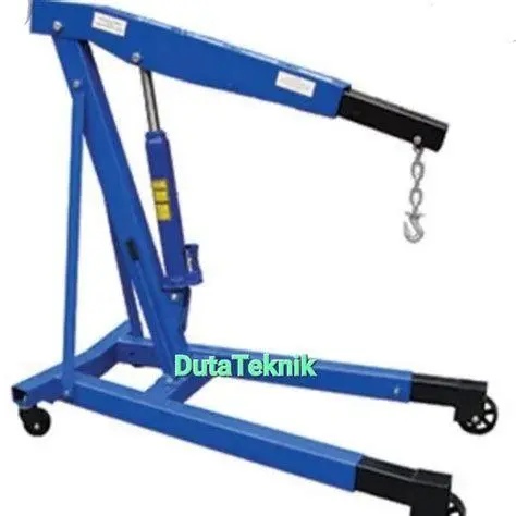 Lift Hidrolik Bengkel Mobil yang diangkat menggunakan lift hidrolik di bengkel