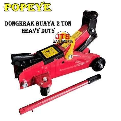 Aplikasi Dongkrak Hidrolik Dongkrak hidrolik sedang mengangkat mobil