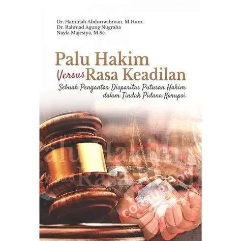 Simbol Hukum dan Keadilan Buku hukum dan palu sebagai simbol silogisme dalam hukum